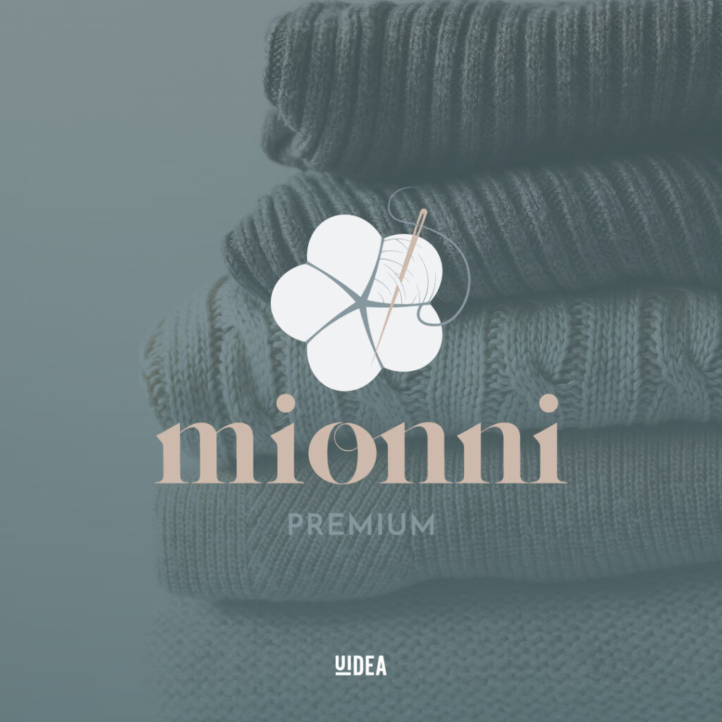 Projekt graficzny logo Mionni Premium na tle pościeli